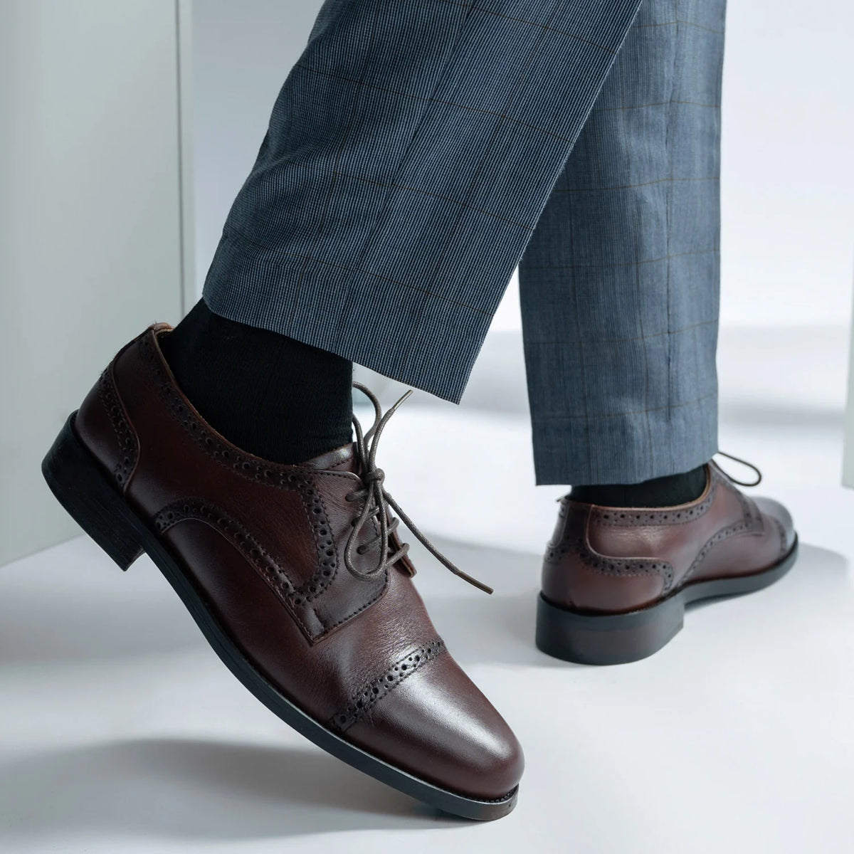 Styled On-Foot Perspective Demonstrating Ankle Fit & Silhouette on Model