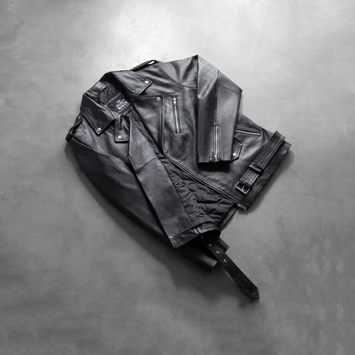 
Zipper & Hem Craftsmanship Construction Detail on Men's Allaric Alley Black Leather Biker Jacket