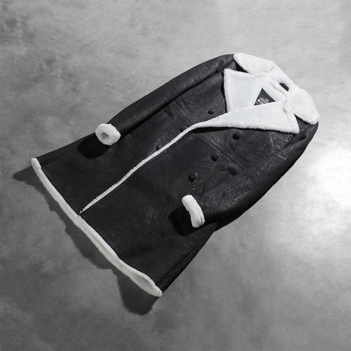 
Open Hem & Hem Craftsmanship Construction Detail on Women's Amie Black Double Breasted Shearling Coat