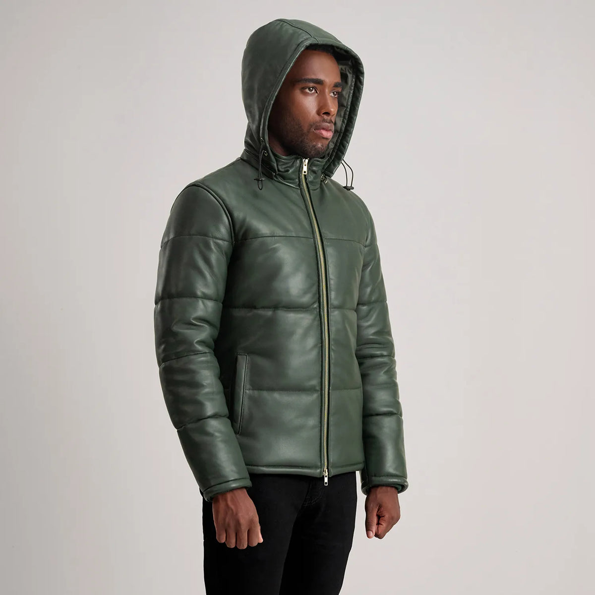 
Styled Fit Perspective of Gordon Tan Hooded Leather Puffer Jacket on Model - Natural Daylight Drape