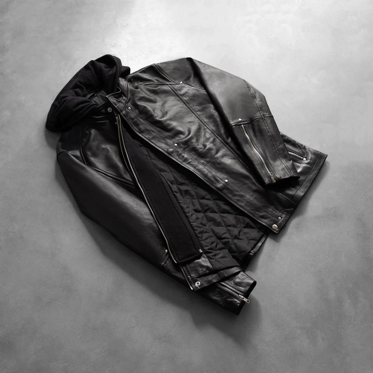 Zipper & Hem Craftsmanship Construction Detail on Men's Highschool Black Leather Jacket