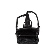 Claire Full-Grain Leather Backpack - Structured Side Profile Showing Gusset Depth & Expansion Capacity