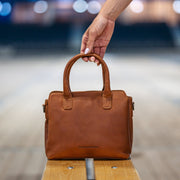 Styled Fit Perspective of Hermosa Full-Grain Leather Handbag on Model - Natural Daylight Drape
