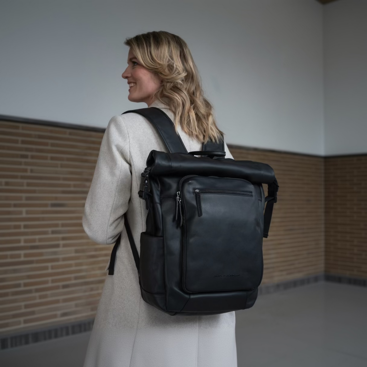 Remo Full-Grain Leather Roll-top Backpack - Structured Side Profile Showing Gusset Depth &amp; Expansion Capacity