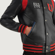 
Close-Up Detail of Varsity & Snap Button Hardware on Liberte USA Black Leather Varsity Jacket