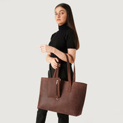 
Distressed Brown Full-Grain leather Bag - Rear Perspective Showing Reinforced Leather Straps & Stitching